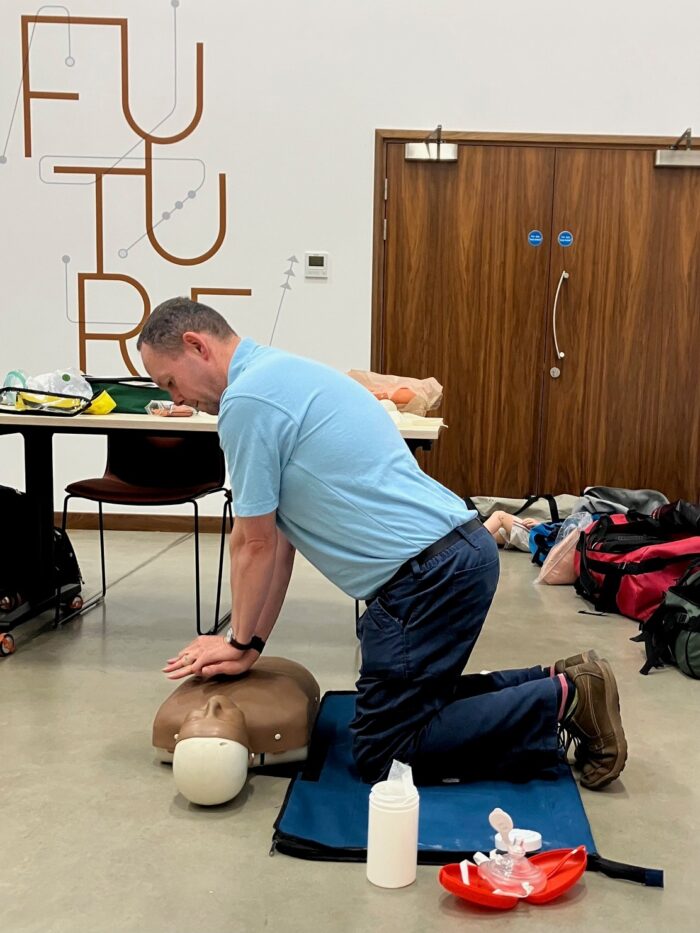 One of our trainers demonstrating CPR at a recent enhanced first aid at work training session.