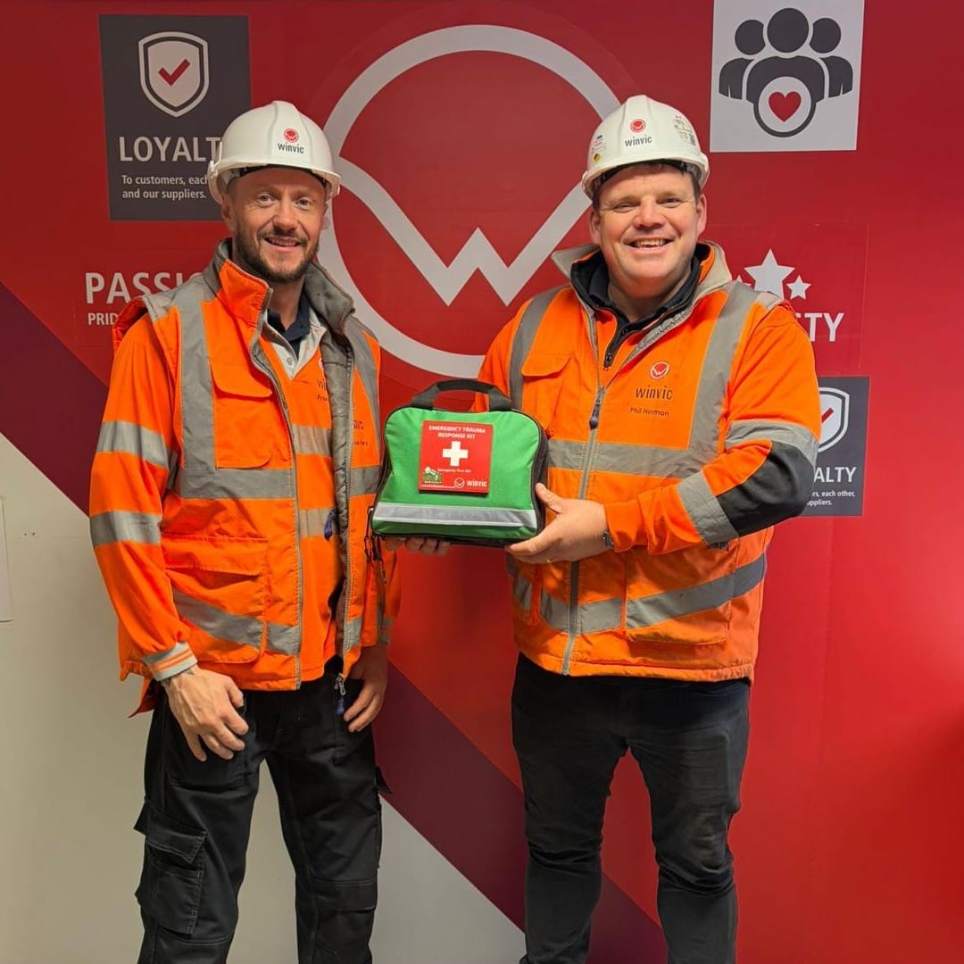 Winvic team members with a Turtle Medical Emergency Response Trauma Kit, bespoke for the construction industry.