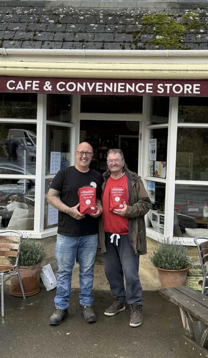 Kyle Hotchkins donating bleed control kit to cafe & convenience store in Evesham